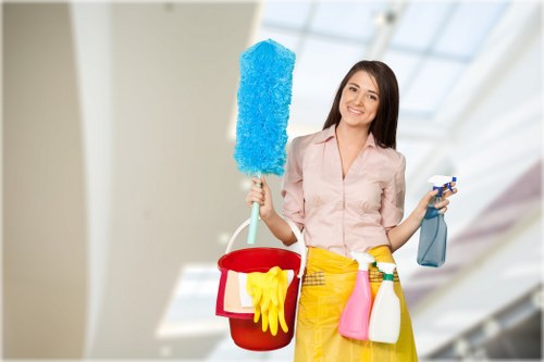 Technician performing steam carpet cleaning in a premium interior
